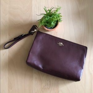 Burgundy Coach leather wristlet
